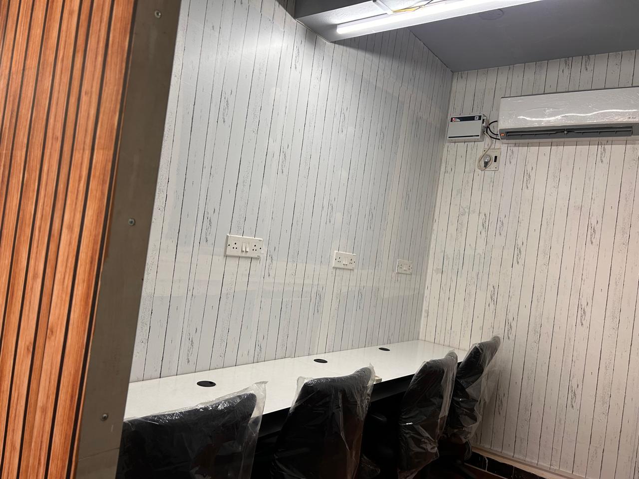 Shared workspace desks at Olive Workspace